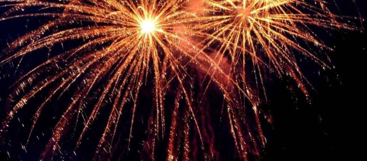 Fireworks lighting up the night sky in Germany during New Year's Eve celebrations.