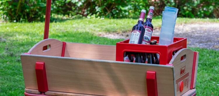 A Bollerwagen with a crate of beer prepared for Father's Day celebrations in Germany.