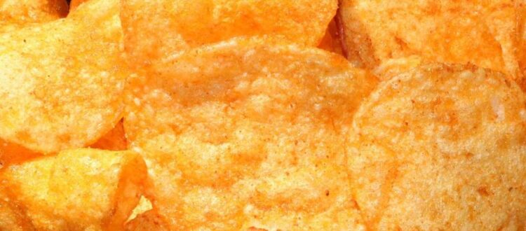 Close-up of crispy, golden potato chips.