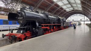 Historic black steam locomotive 52 5448-7 at Leipzig Central Station platform